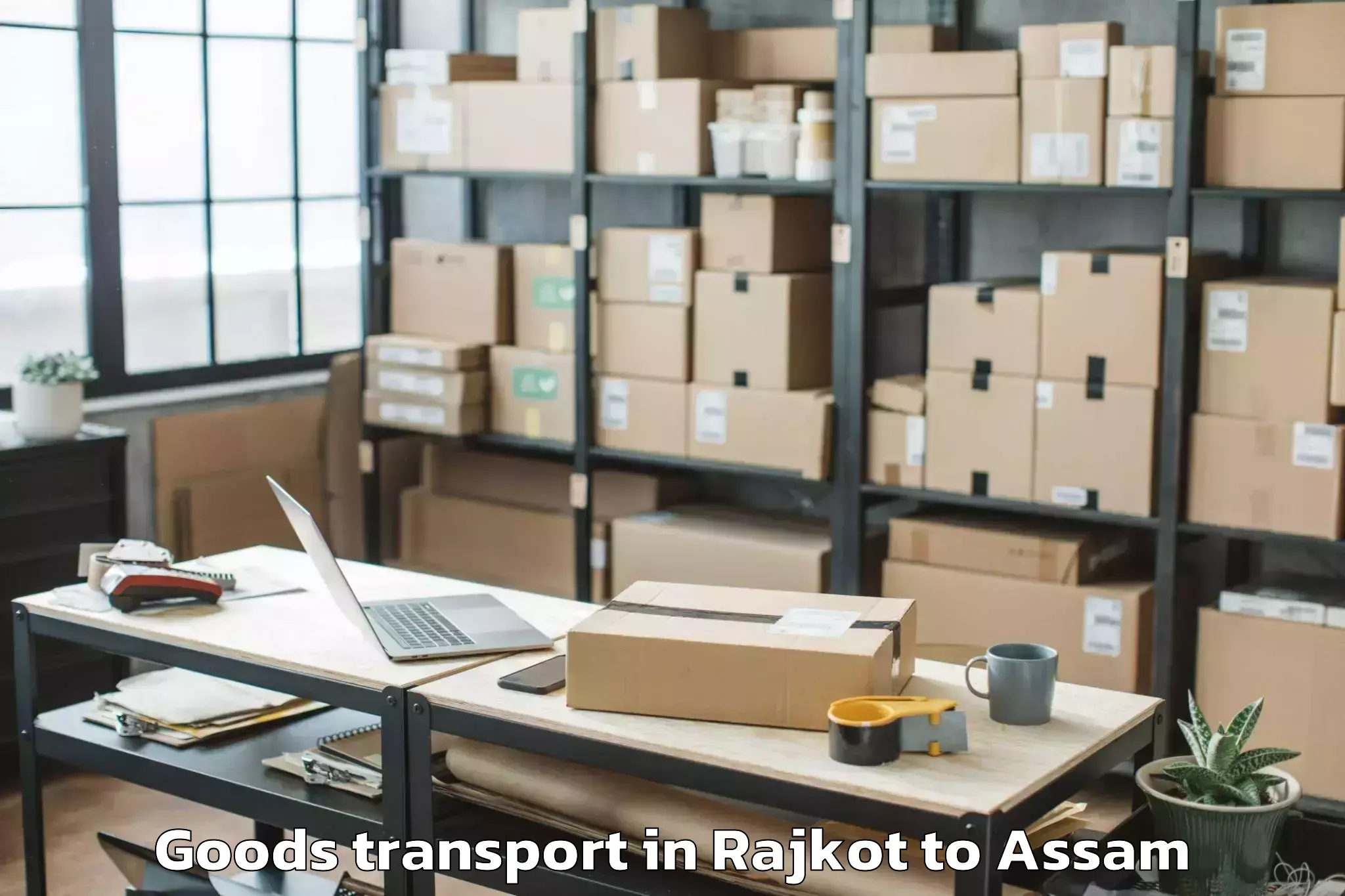 Top Rajkot to Abhilashi University Jorhat Goods Transport Available